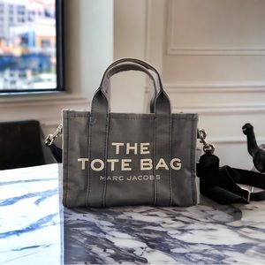 Selling a blue mini tote bag for sale.